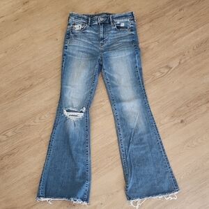 American Eagle Super Hi-Rise Flare Destoryed Jeans